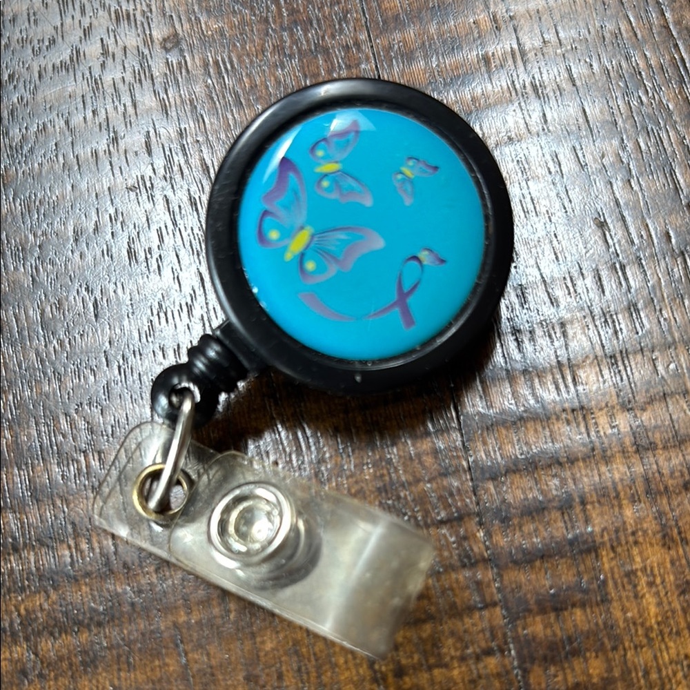Butterfly Badge Reel with Black and Blue Design